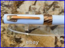 Delta Tork Momo-design Rollerball. White Resin & Rose Gold Trim New In Box! RARE